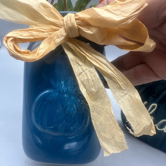 Decorative Orange Flower Arrangement in Blue pint jar and ceramic pumpkin decor - Picture 9 of 10